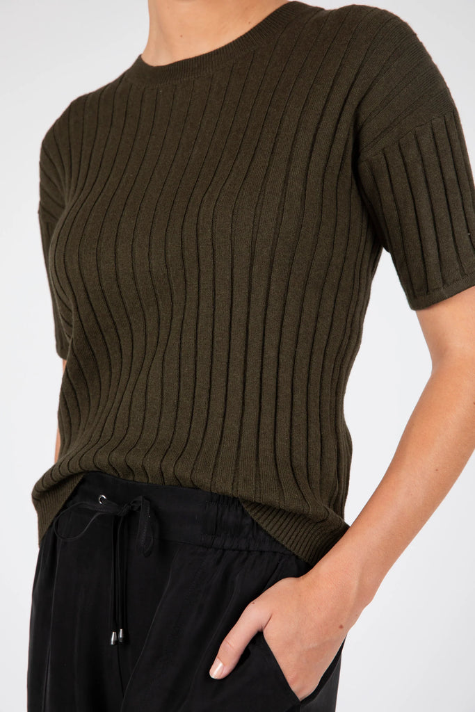 Marlow Reign Rib Knit tee Cypress Green on model front view with black Aspire Pants