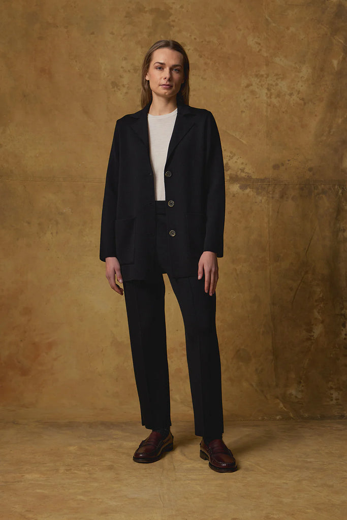 Standard Issue Merino Milano Jacket Black on model with Merino Milano Pants in Black