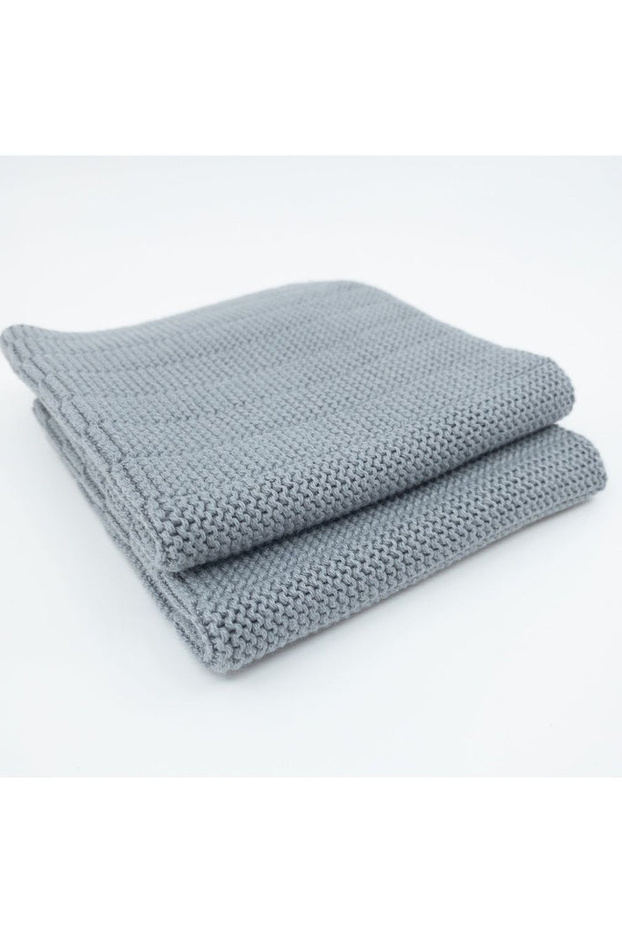 Ecovask 2 pack organic cotton dish cloths in Steel a Lighter Blue Grey.  Cloths folded and stacked on top of one another . Photographed on an angle.