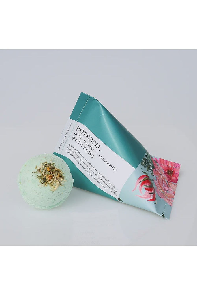 Botanical Mint Manuka and Chamomile Bath Bomb showing packaging and the Bath Bomb