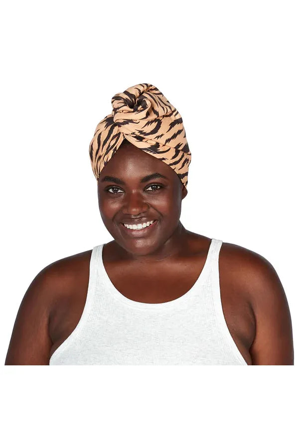 Dock & Bay 100% Recycled Hair Wrap or Hair Towel Fierce Tiger neutral background with black tiger stripes. Frontal shot of Model  wearing Hair Wrap.