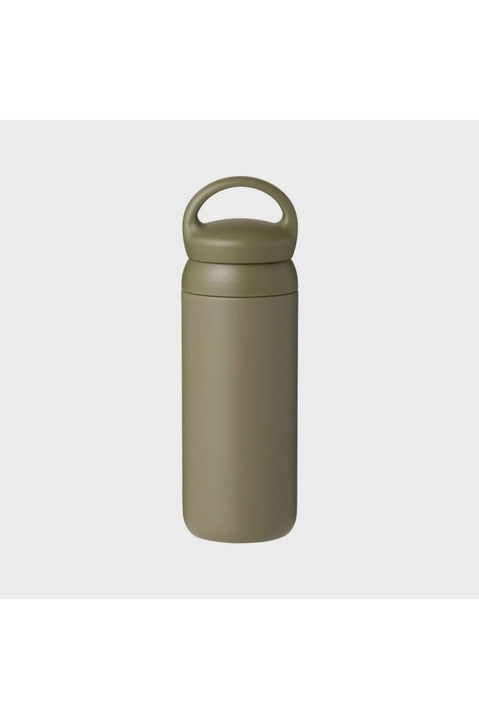 Kinto Day of Tumbler. Kahki Green insulated tumbler with a handle on a light grey background.