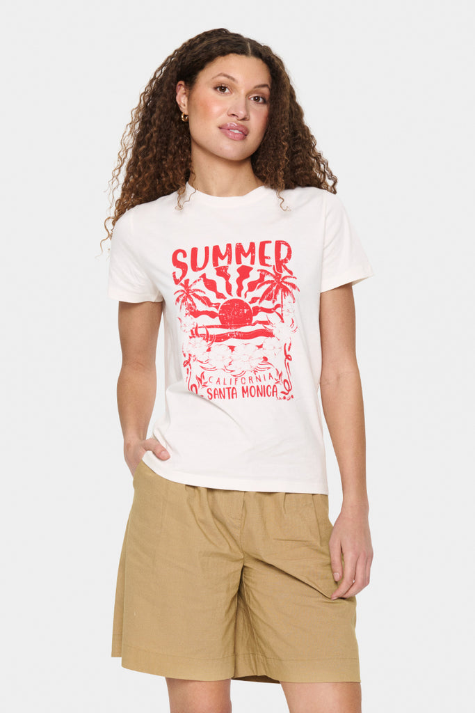 Beige t-shirt with red 'Summer California Santa Monica' graphic design on a white background.  Saint Tropez Kuvi T-Shirt in Ice.