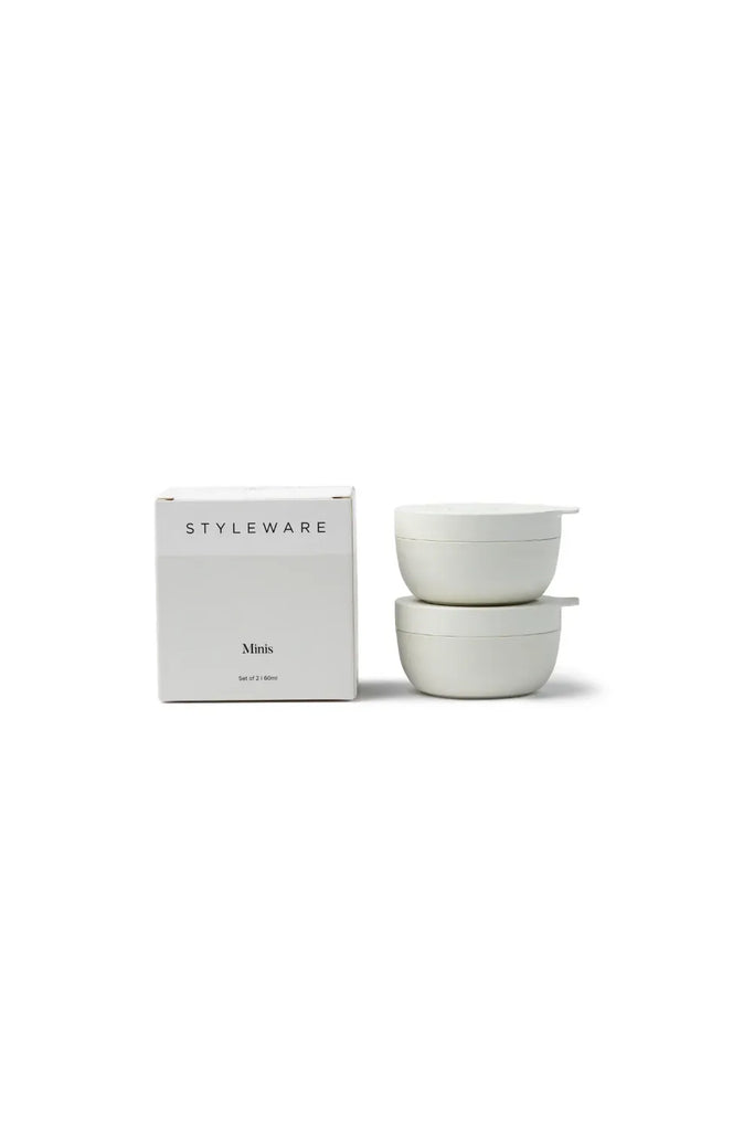 Two white Mini Styleware bowls stacked sitting beside the boxing showing the 'Styleware' logo on the box in Black and the description of what the box contains 'Minis' 'Set of 2 | 60ml'