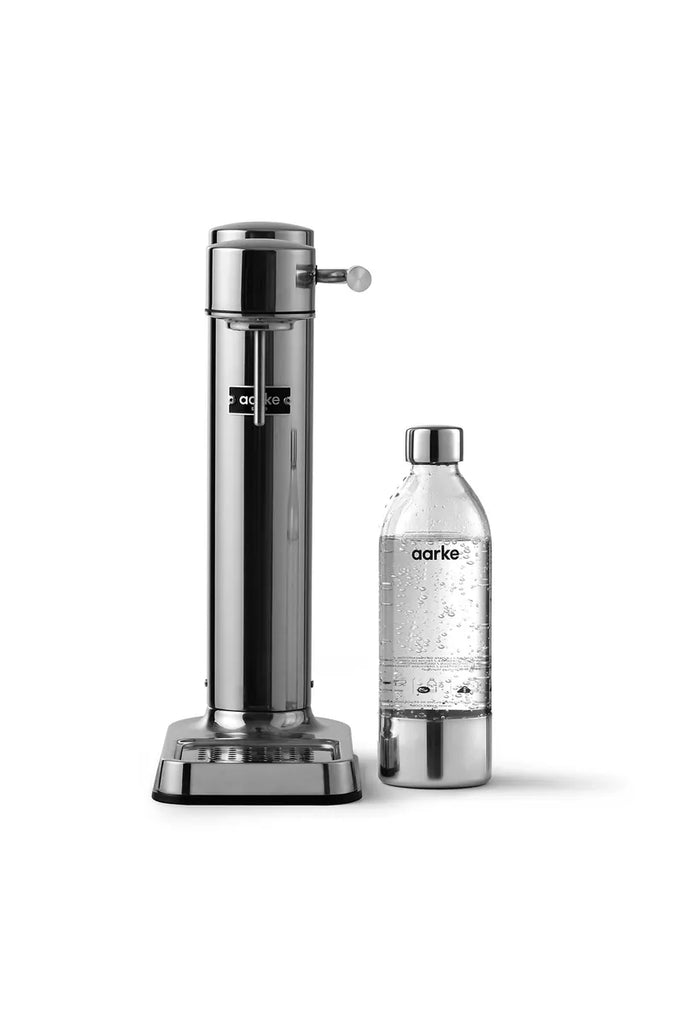 Aarke sparkling water dispenser and bottle on a white background