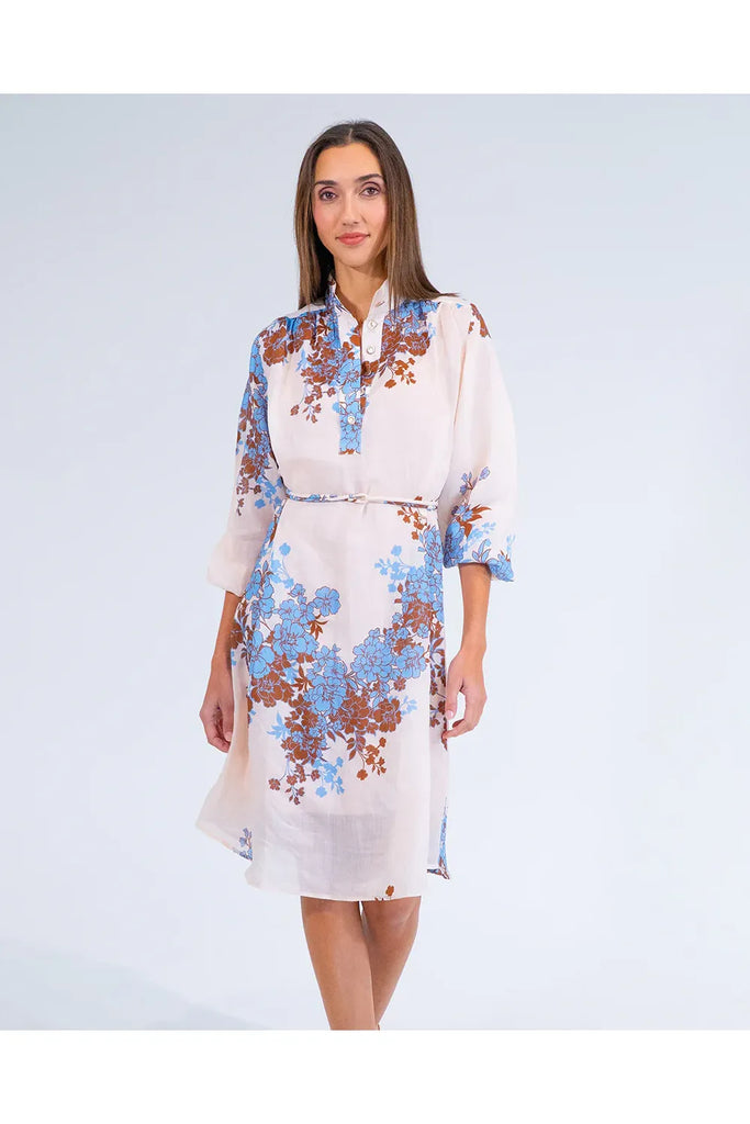 Woman wearing a floral dress on a white background. Arlington Milne Emerson Dress in Wisley Floral.