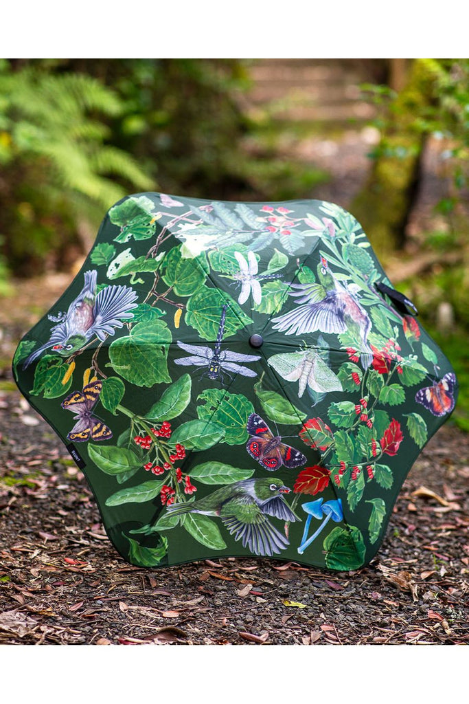 Blunt x Forest & Bird Metro Umbrella featuring design by Erin Forsyth. Image showing exterior canopy of the umbrella whilst placed on a forest floor.