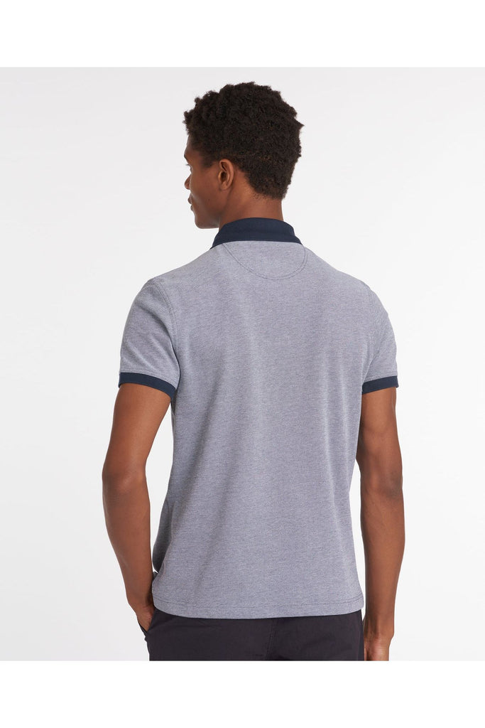Man wearing a Barbour Essential Sports Mix Polo Shirt in Midnight blue