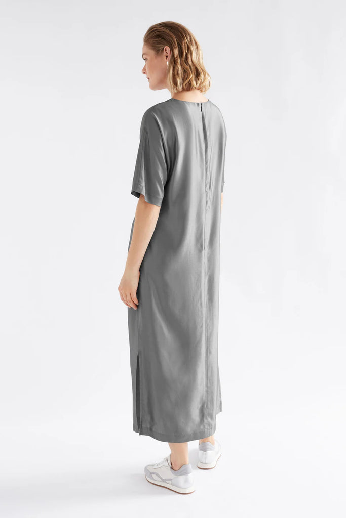 Woman wearing a gray dress on a white background. Elk Lissu dress