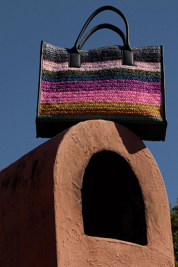 Multicolored striped handbag with black handle. Elk Vavda Tote Kalla Print