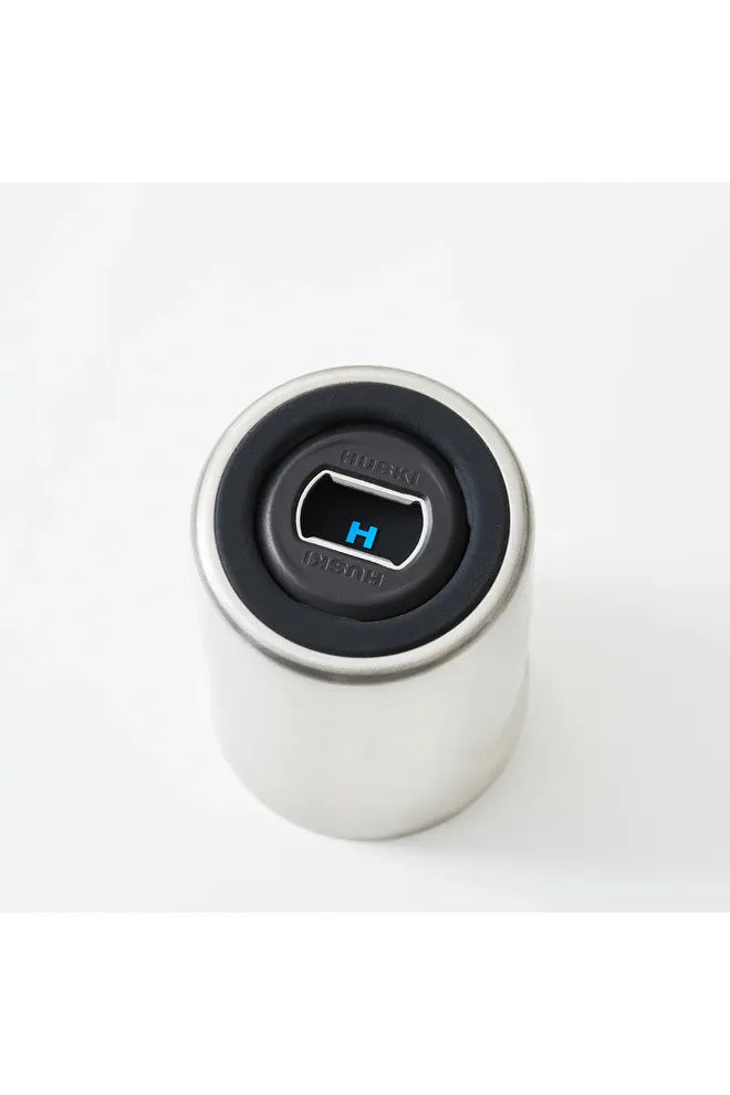 Huski_Beer_Cooler_2.0_Stainless_Steel_Image_showing_Detachable_3-in-1_Can_Opener_Built_Into_Base_Crisp_Home_Wear