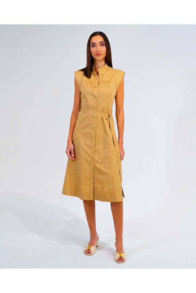 Woman wearing a camel cotton shirt dress on a white background. Arlington Milne Iris dress in Camel.