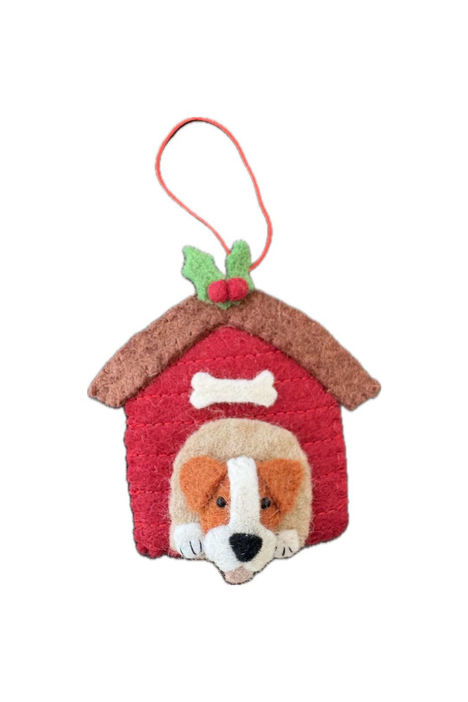 Pashom hanging  Felt doghouse christmas ornament with a Jack Russell's face poking through the door on a white background.