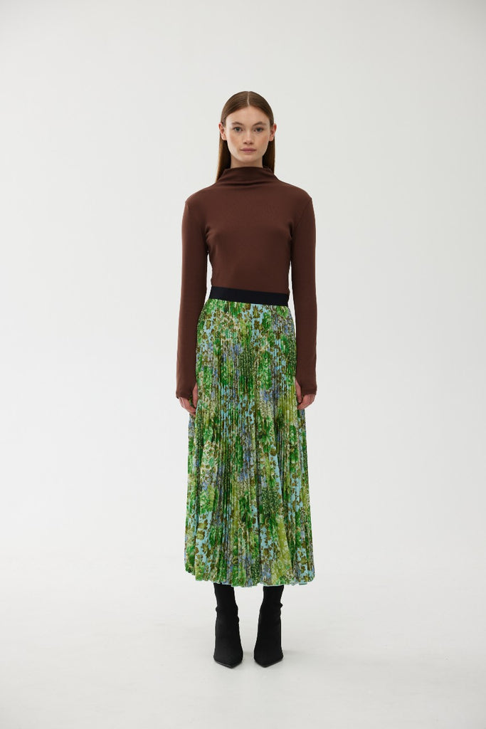 Kinney Goldie Pleat Skirt Floral Green Haze on model front view