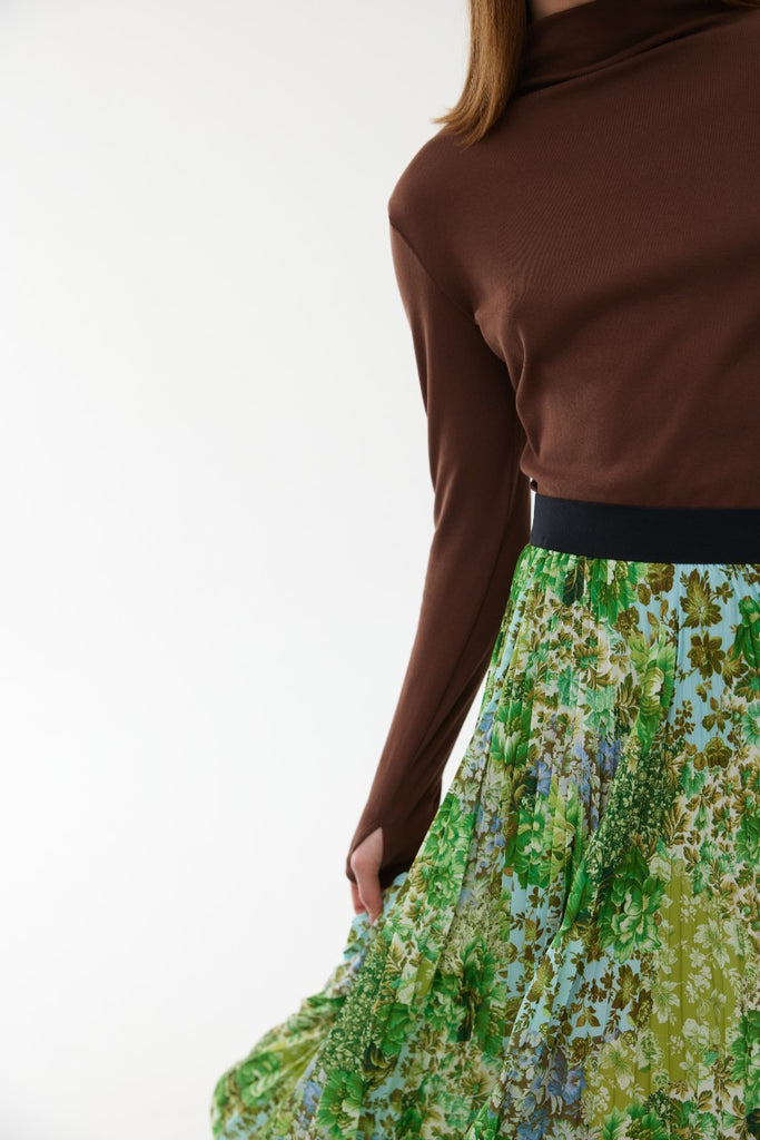 Kinney Goldie Pleat Skirt Floral Green Haze on model close up