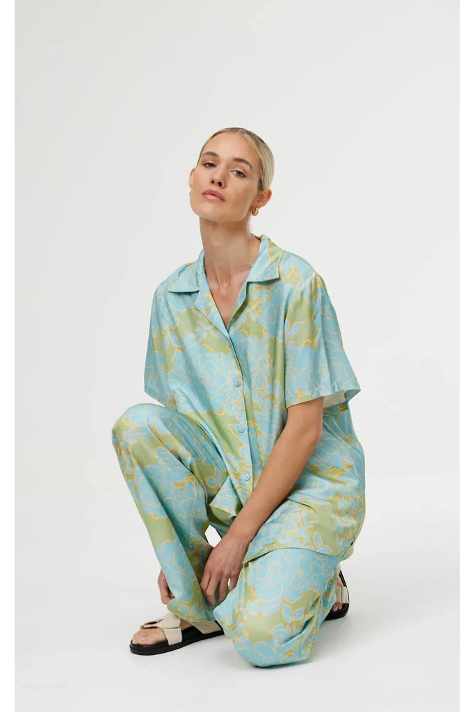 Kinney Luisa Shirt Ocean Bloom 100% Viscose worn with matching Luisa Pant