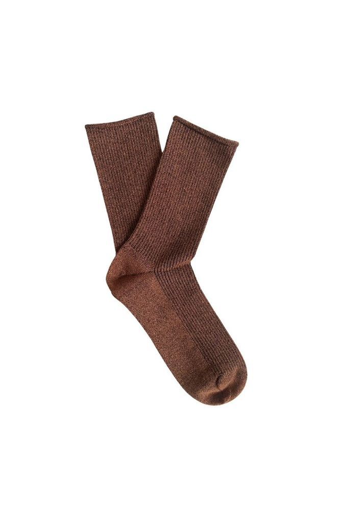 Pair of Klue Camel brown glitter lurex socks on a white background