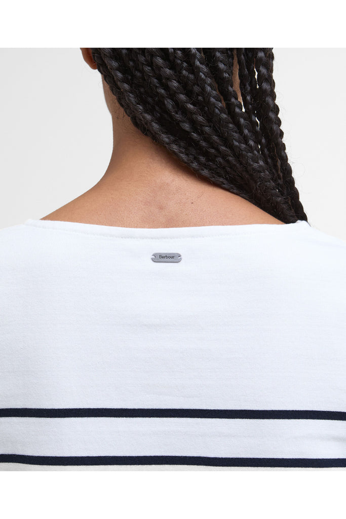 Person wearing a striped sweater with 'Barbour' branding on a plain background. Barbour Hawkins Top in Cloud Stripe.