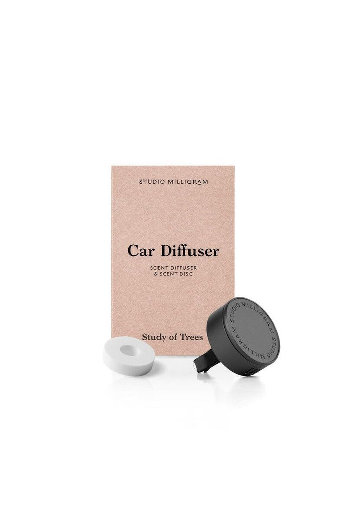Car diffuser set with packaging labeled 'Studio Milligram' on a white background