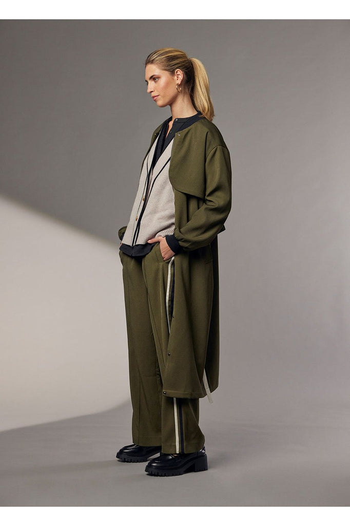 Madly Sweetly Operator Pant Olive on model with Matrix Coat in Olive
