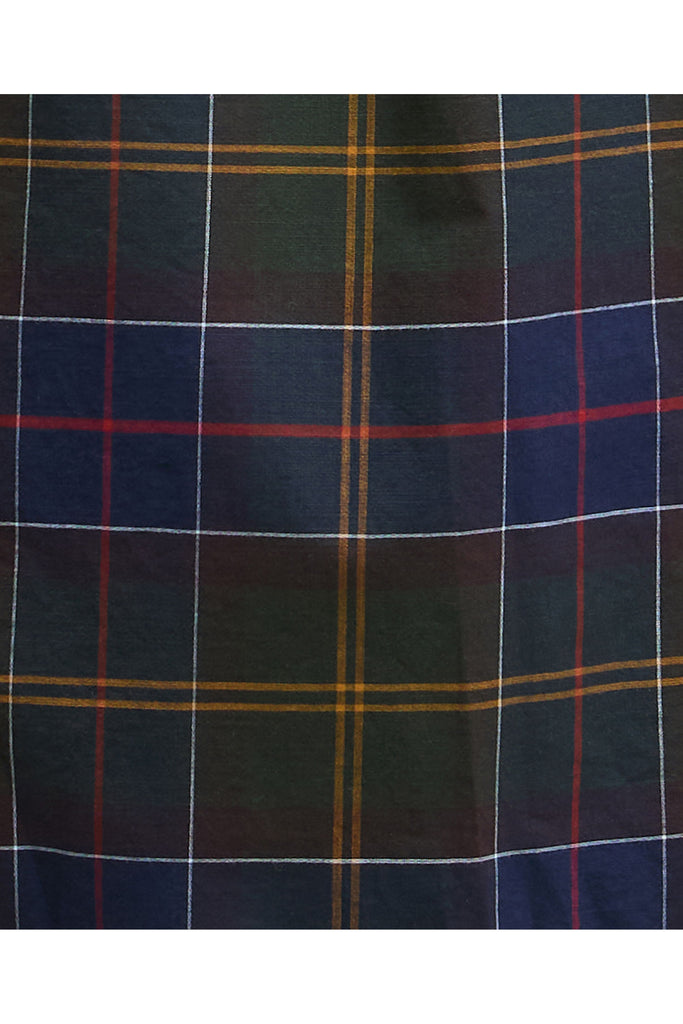 Man wearing a plaid shirt and beige pants on a white background. Barbour Gordon Summer Shirt in Classic Tartan.