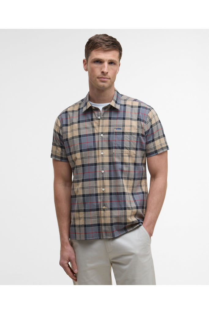 Man wearing a plaid short-sleeve shirt on a plain background. Barbour Gordon Summer Shirt in Dress Tartan.