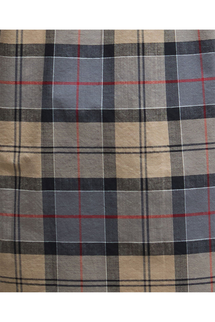 Man wearing a plaid short-sleeve shirt on a plain background. Barbour Gordon Summer Shirt in Dress Tartan.