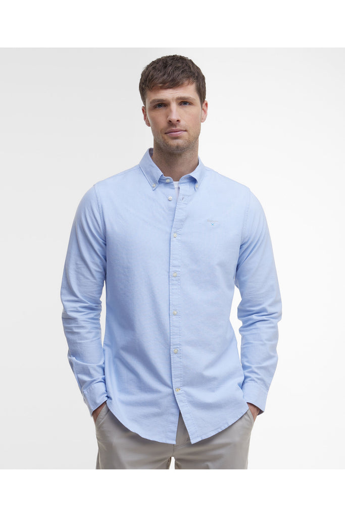 Man wearing a Barbour light blue button-up shirt against a plain background. The Barbour Oxtown Tailored Shirt in Sky.