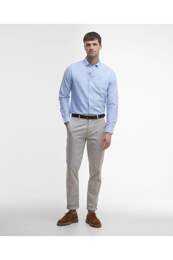 Man wearing a Barbour light blue button-up shirt against a plain background. The Barbour Oxtown Tailored Shirt in Sky.
