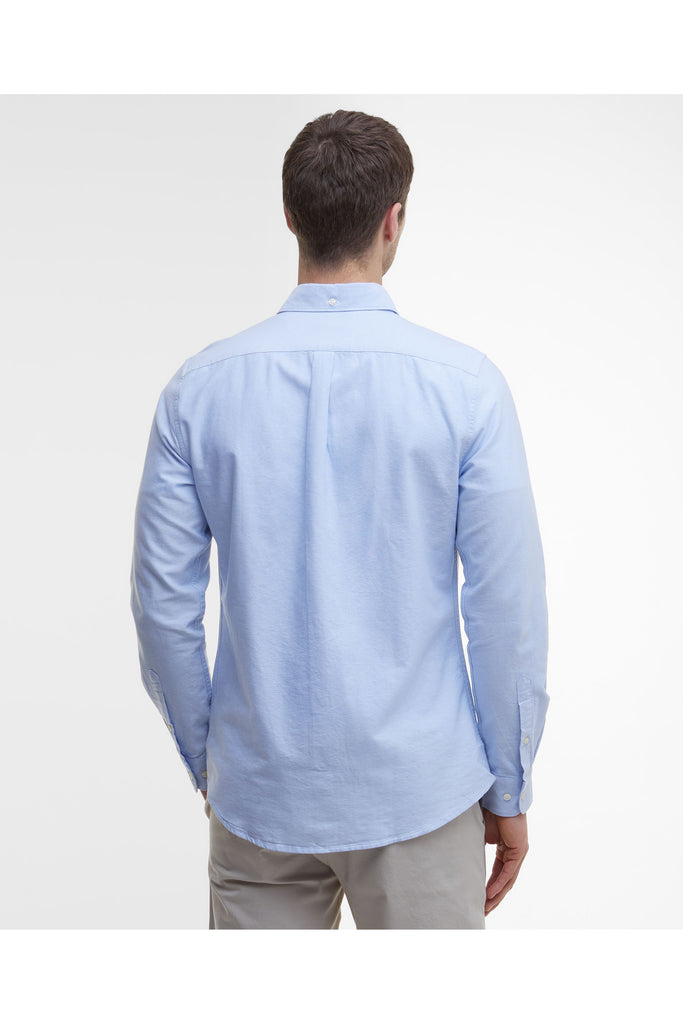 Man wearing a Barbour light blue button-up shirt against a plain background. The Barbour Oxtown Tailored Shirt in Sky.