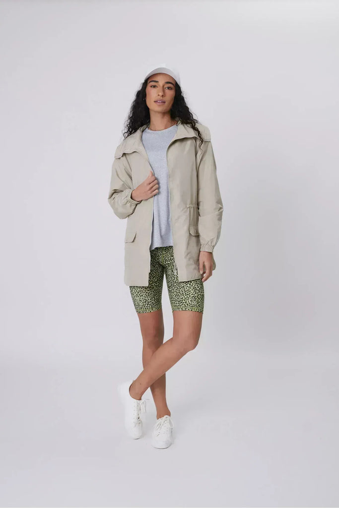 Person wearing green patterned shorts on a plain background. Marlow Circuit Bike Short in a green Willow Print.