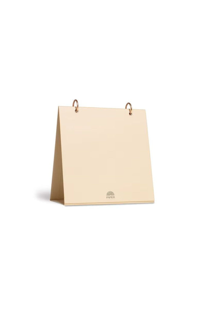 Papier 2026 Desk Calendar Beige back of calendar with a gold logo on a white background