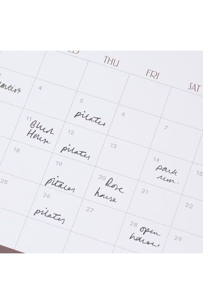 Papier 2026 Desk Calendar with handwritten entries on a white background