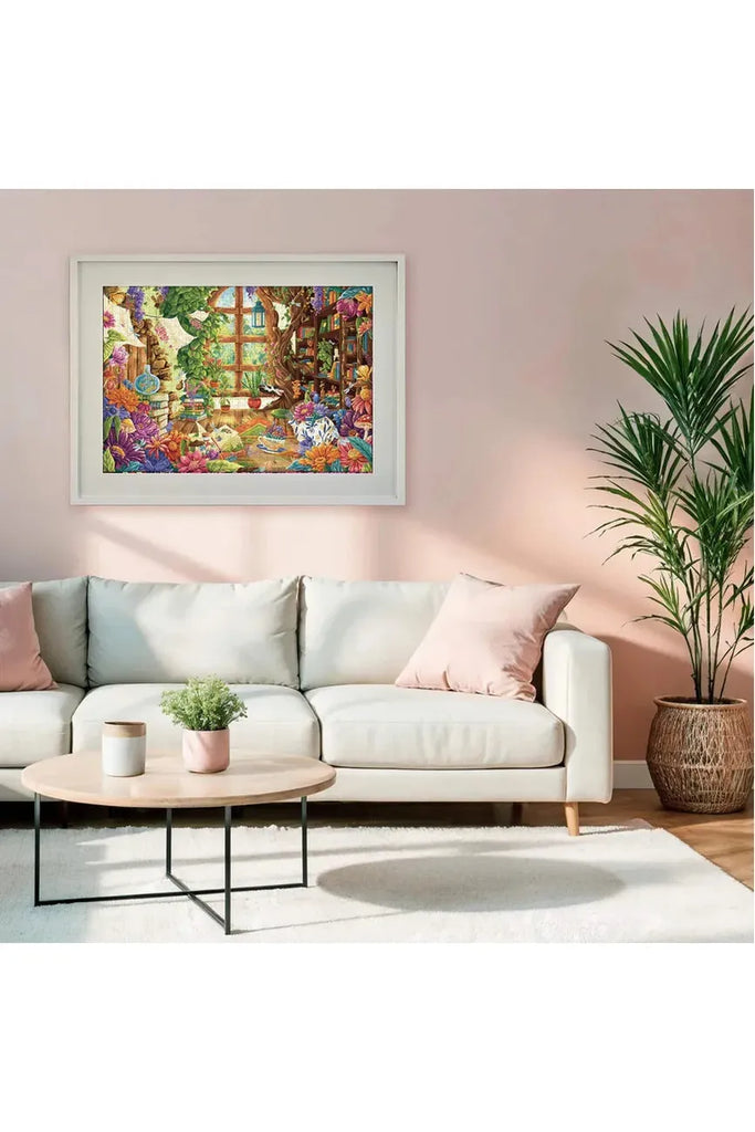 Piece House and Zoe Gillett's collaboration jigsaw puzzle titled 'Petals & Pages'.  Completed puzzle framed and hanging on the wall above a sofa and other decorative items.
