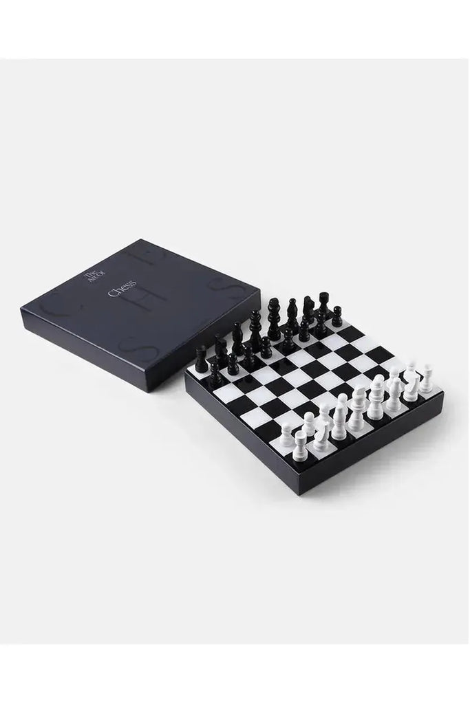  Printworks Chess Set. A compact chess set with pieces and a board in a black box, displayed against a white background. 