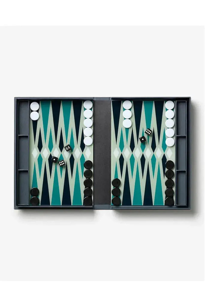 The Printworks Backgammon Classic set is beautifully displayed, showcasing the game board, pieces, and dice, inviting everyone to play and enjoy! a 