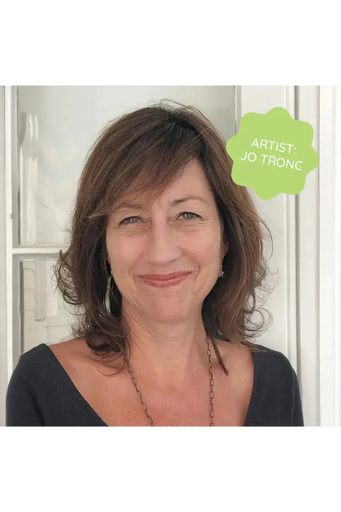 An image of Jo Tronc, who collaborated with Piece House Puzzles to produce a puzzle titled 'Feast & Fizz.'