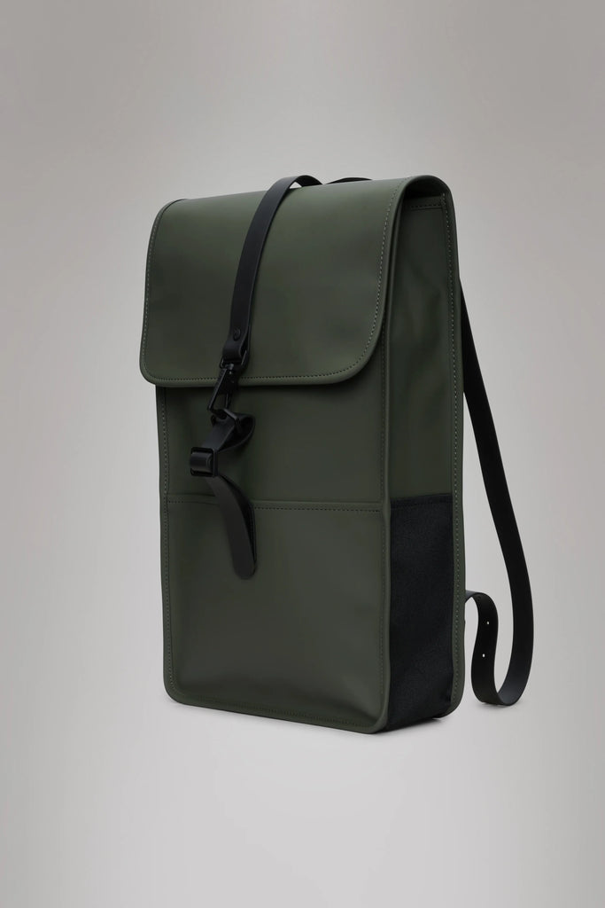 Khaki green backpack against a plain background. Rains Green backpack.