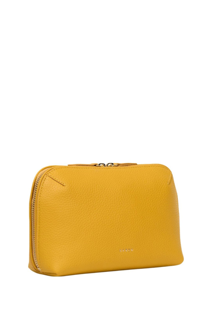Yellow leather pouch on a white background. Saben Tate Tech Pouch in Marigold yellow leather.