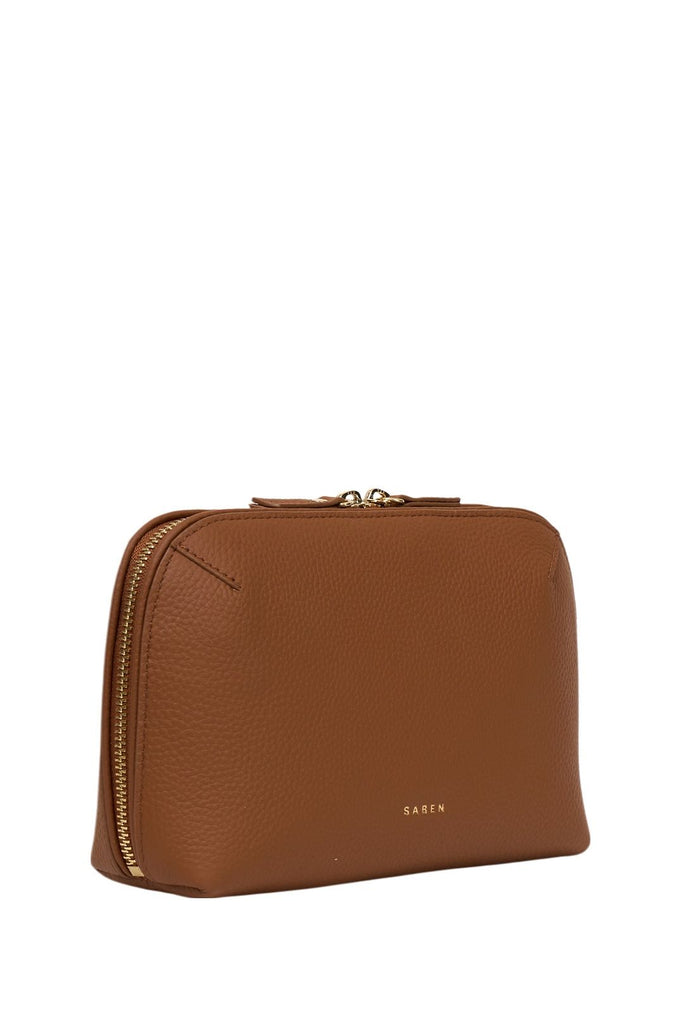 Brown leather pouch with gold zipper on a white background. Saben Tate Tech Pouch in Tan leather