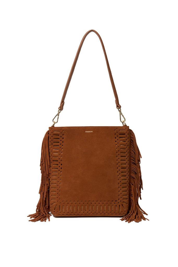 Brown suede handbag with fringe details on a white background. Saben Claudette Fringed Tassel Crossbody Bag in Tan Suede.