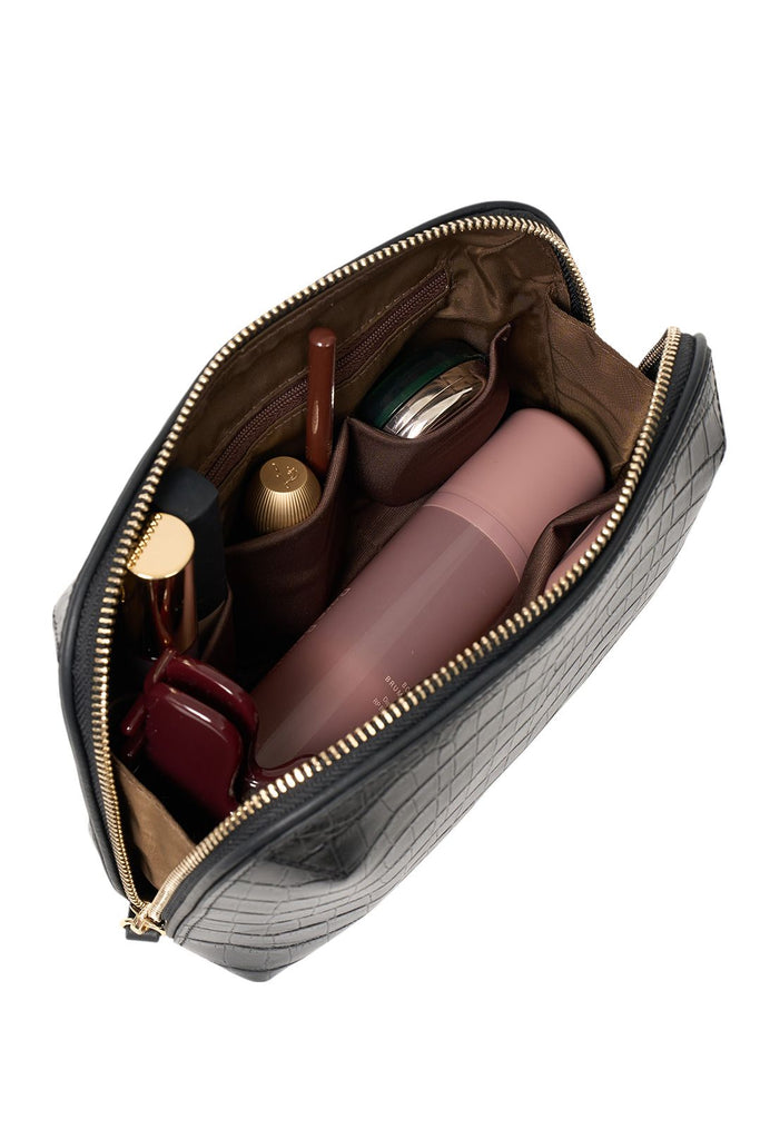 Black crocodile-patterned travel pouch on a white background. Saben Tate Tech Pouch in Black Croc Leather.