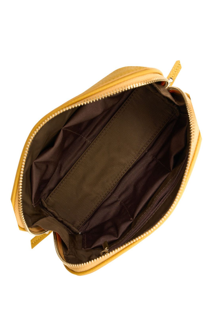 Yellow leather pouch on a white background. Saben Tate Tech Pouch in Marigold yellow leather.