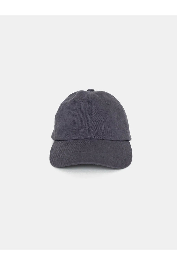 blue cap. Sophie Twill Cap in Denim.on a white background.