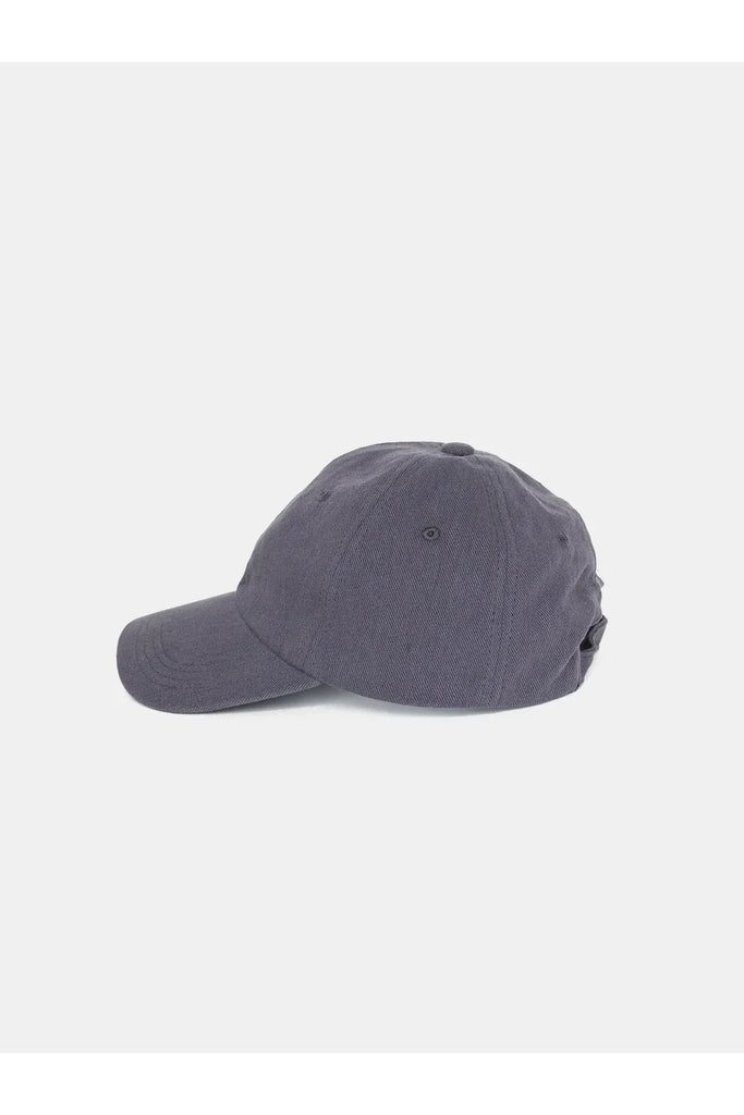 blue cap. Sophie Twill Cap in Denim.on a white background.