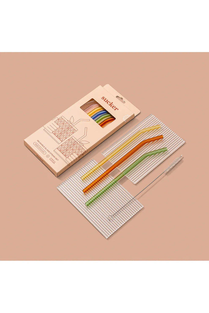 Sucker Reusable multi-coloured glass  Set of six colourful straws and a cleaning tool on a beige background with 'sucker' packaging.
