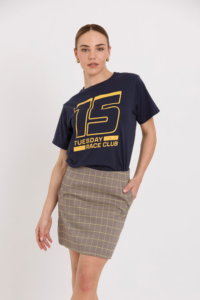 Tuesday Label Band Tee Navy 15 on model with Emili Mini Skirt