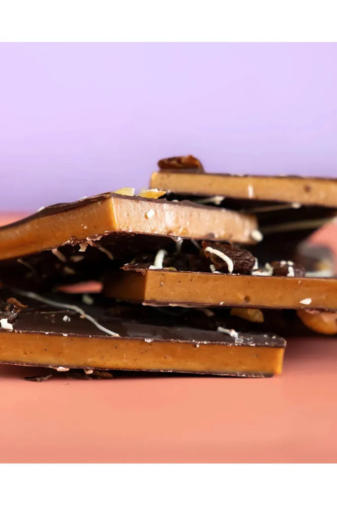 The Confectionist of Dark Chocolate & Spiced Toffee Pieces stacked.