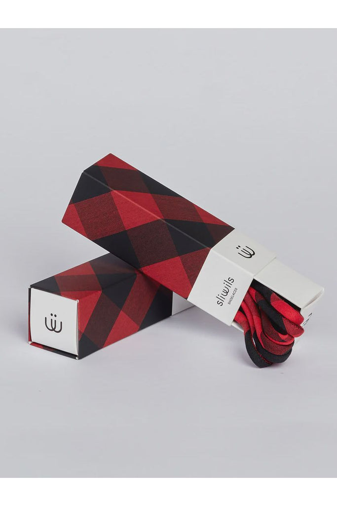 Red and black checkered Shoelaces with a matching box on a light gray background