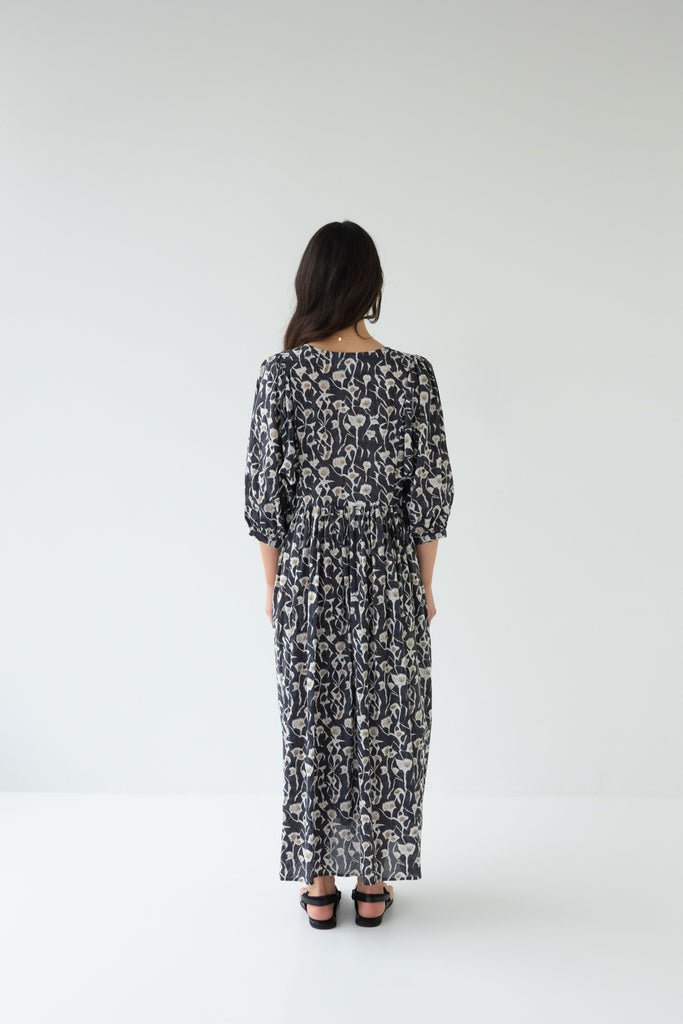 Woman wearing a Sophie Cotton Midi Dress in Coast floral print